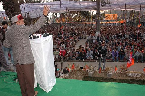Himachal CM Dhumal addressing a public meeting