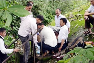 Crime police fishing out the skeletal remains of the kidnapped boy from the water tank